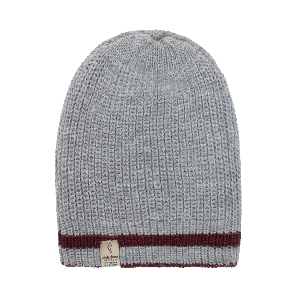 Grey reversible alpaca beanie with a burgundy stripe