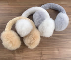 Fluffy alpaca earmuffs in camel, grey and white, handmade by artisans in Peru